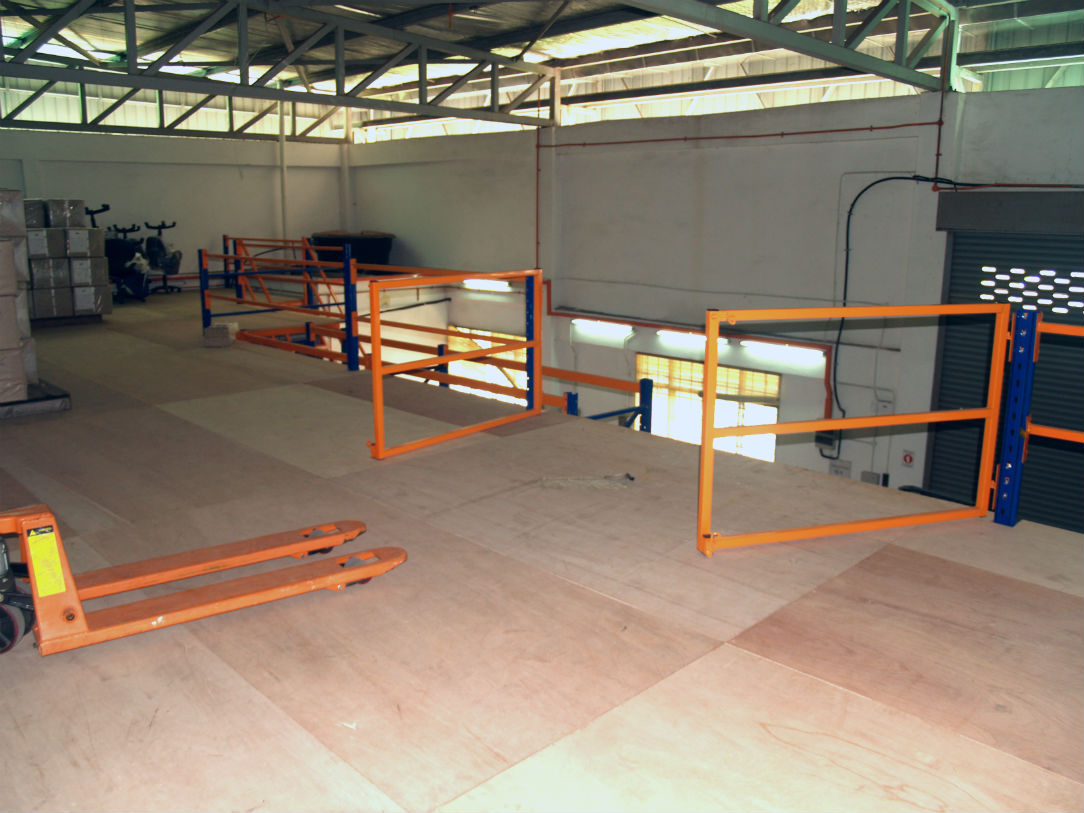 Swing type Pallet Gate on Nutech Rack Supported Platform.