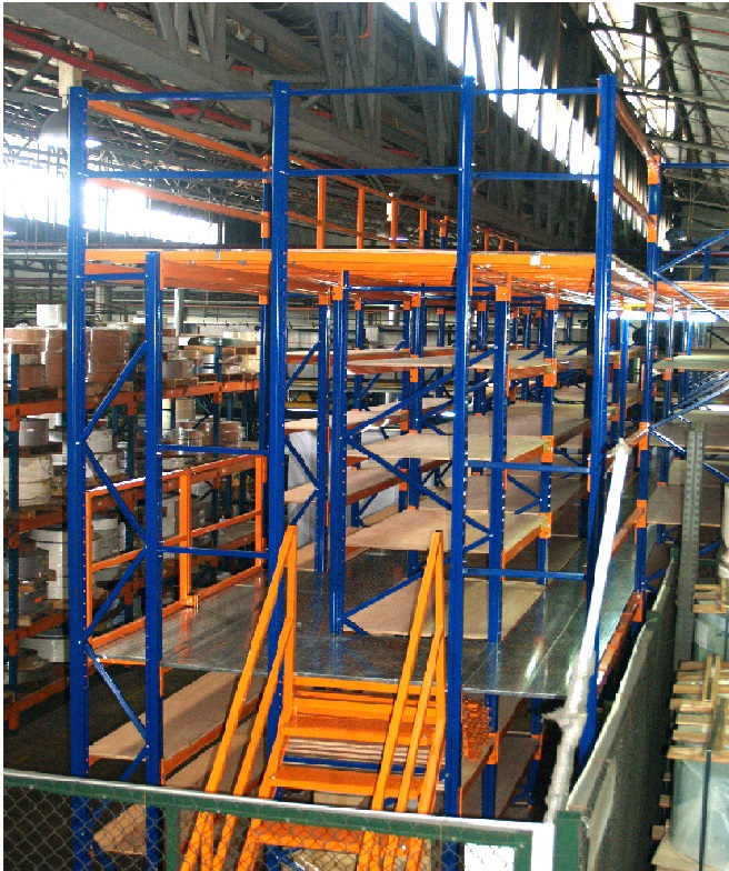 Handrails are installed on each level as a safety features to prevent accidents of falling over the edge. Galvanized Steel installed as flooring, Plywood installed as shelving deck.