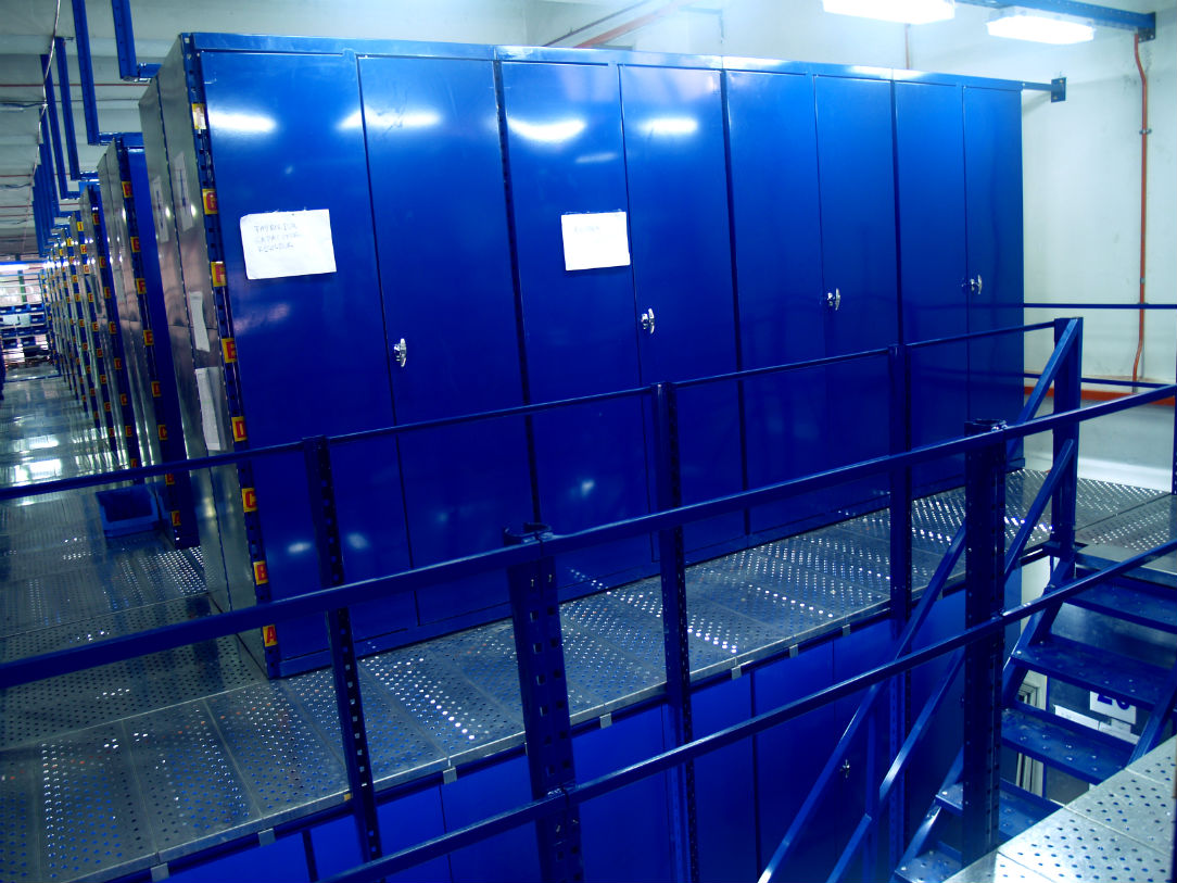 Image of door installed on Modular Multi-tier System with lock mechanism.